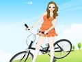Игра Одень девушку на велосипеде онлайн