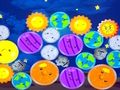 Игра Объедините счастливые планеты онлайн