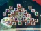 Игра Among Mahjong Tiles онлайн